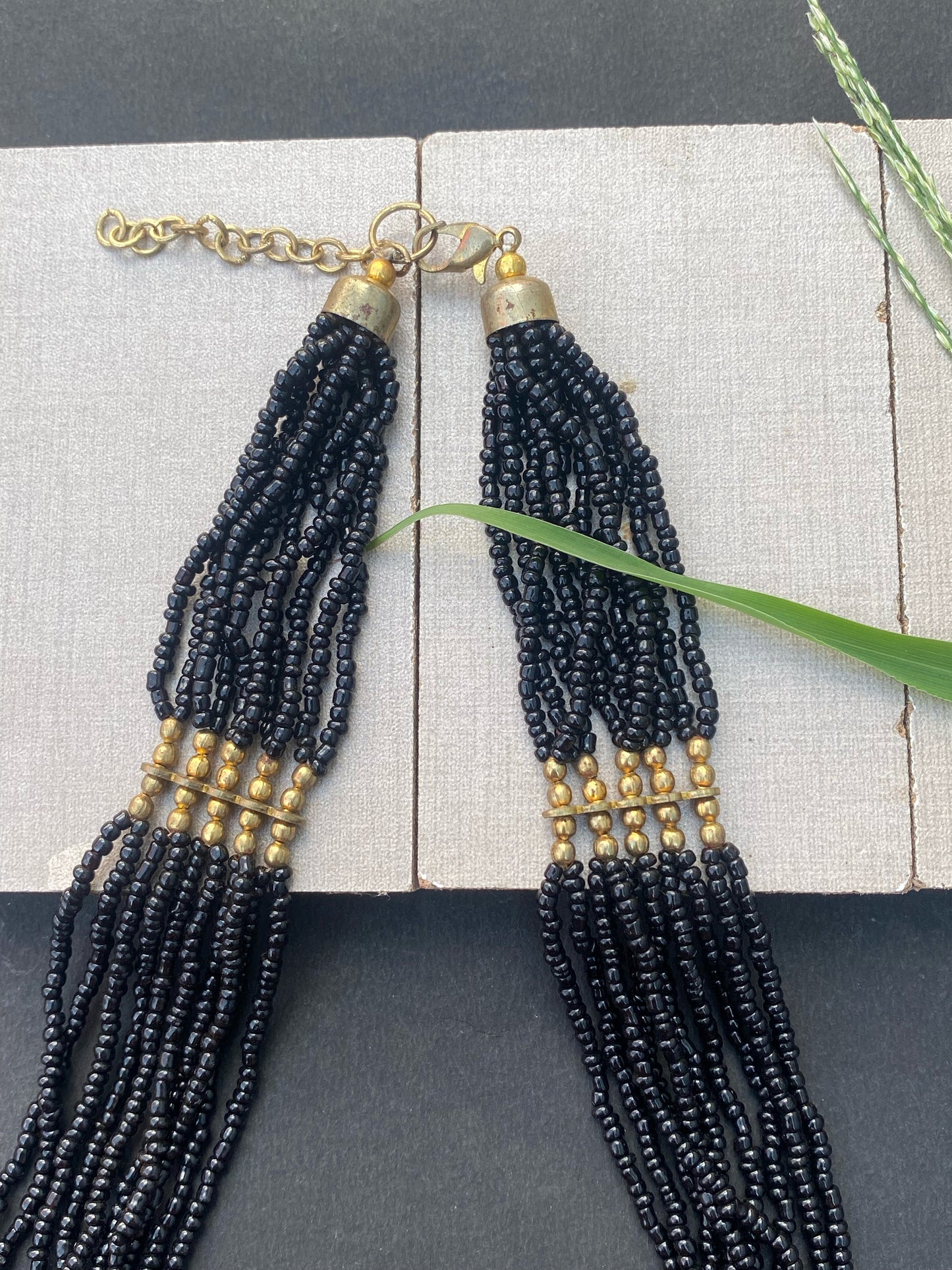 Black Multi-Strand Beaded Necklace with Antique Gold Accents