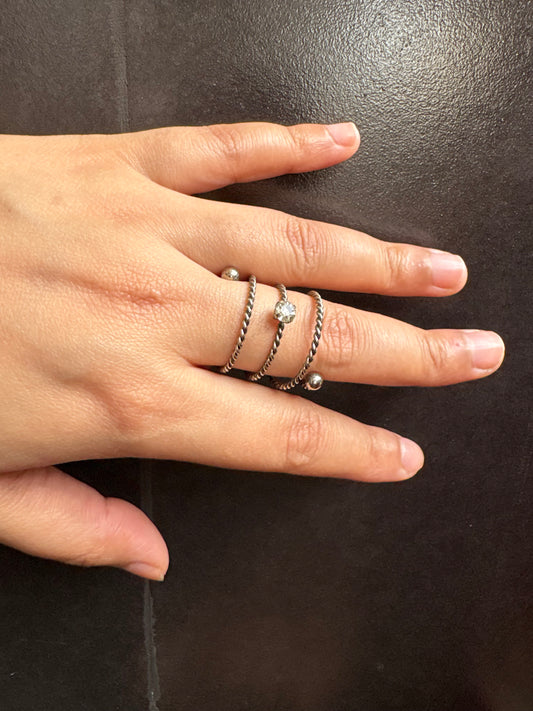 Elegant Spiral Silver Ring with Crystal Stone