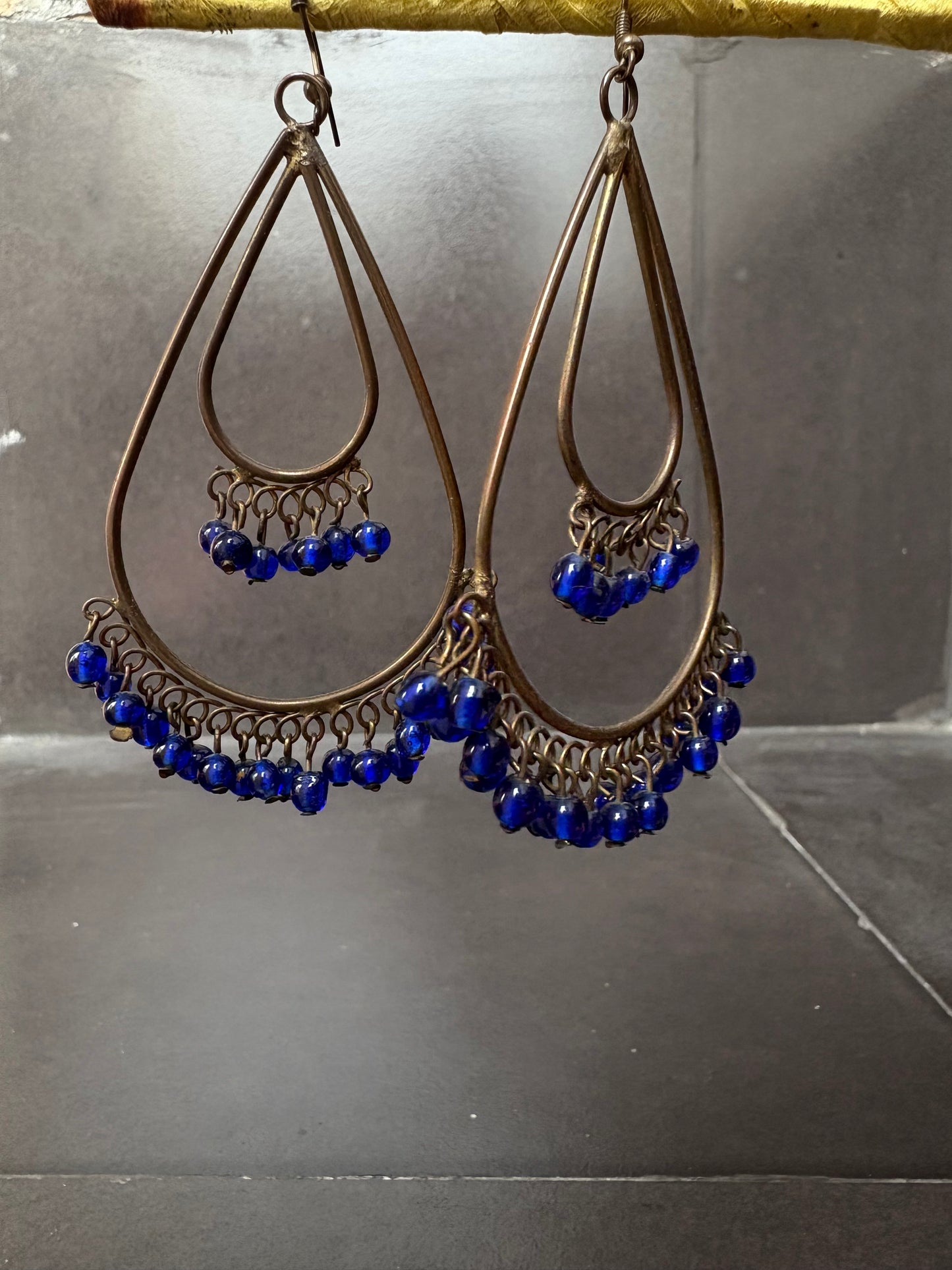 Antique Brass Teardrop Earrings with Blue Beads