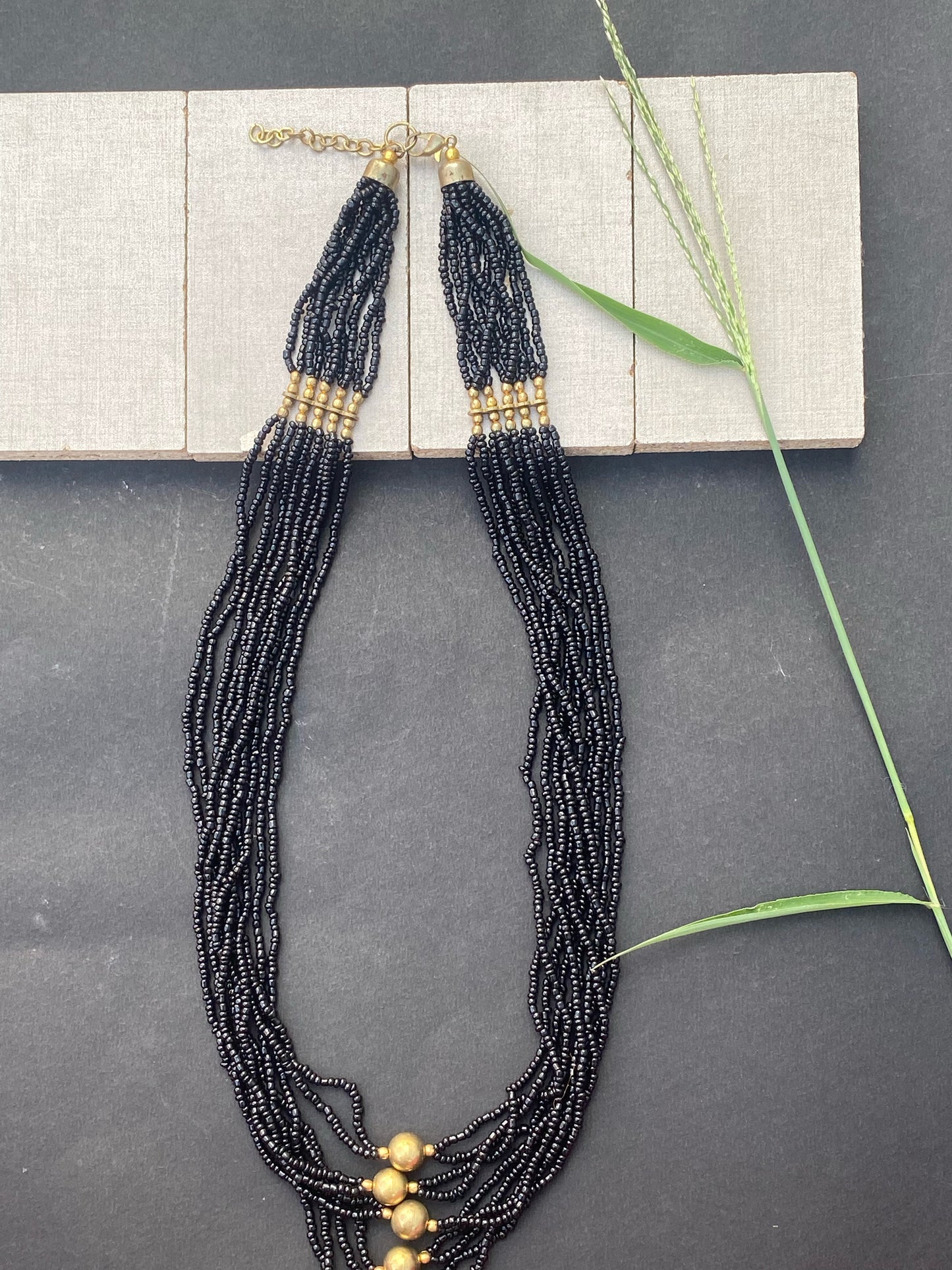 Black Multi-Strand Beaded Necklace with Antique Gold Accents