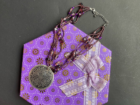 Bohemian Multi-Strand Beaded Necklace with Statement Pendant