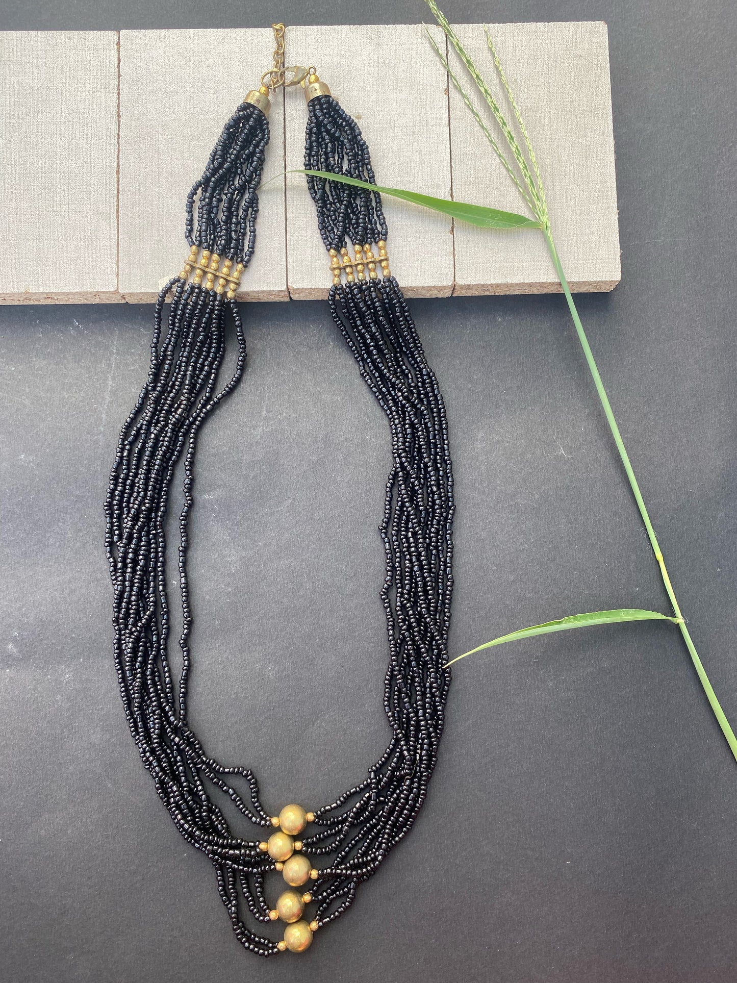 Black Multi-Strand Beaded Necklace with Antique Gold Accents